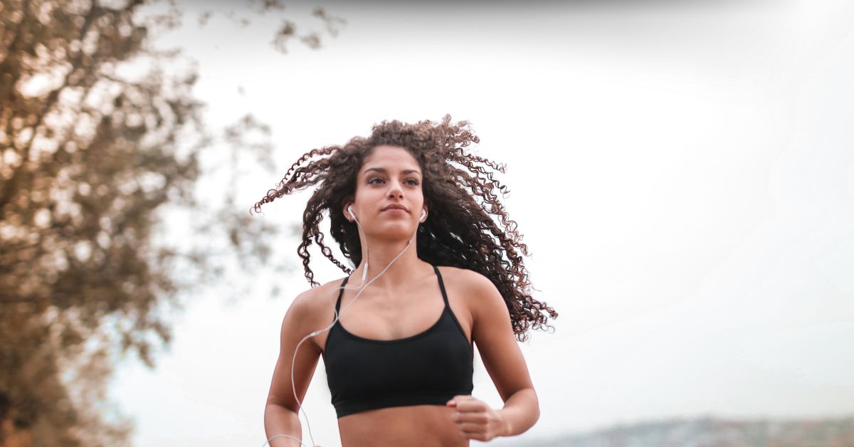 Woman in Black Sports Bra Running